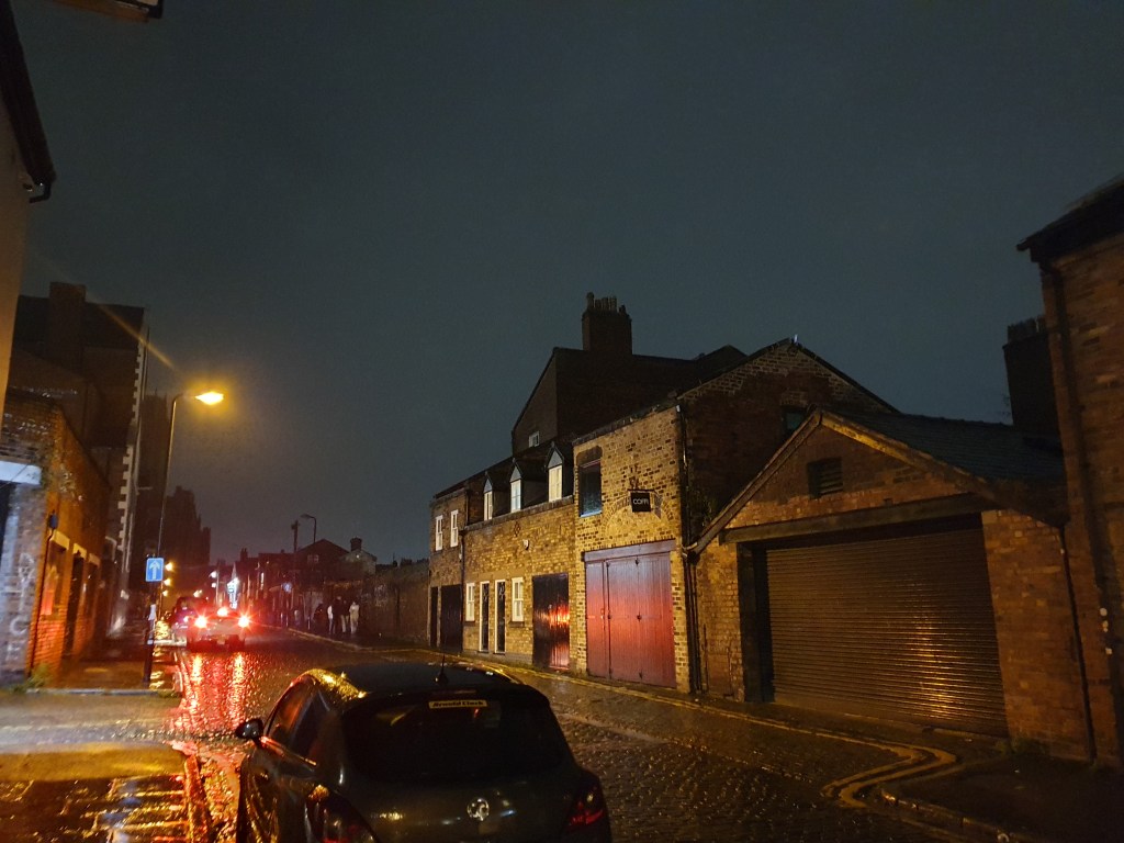 View of buildings and street taken at night